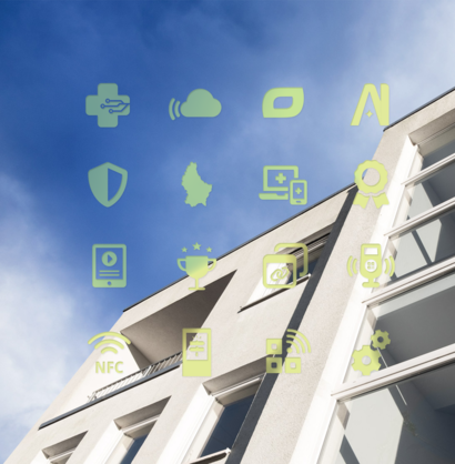 An employee on the move, leaving the workstation with screens.